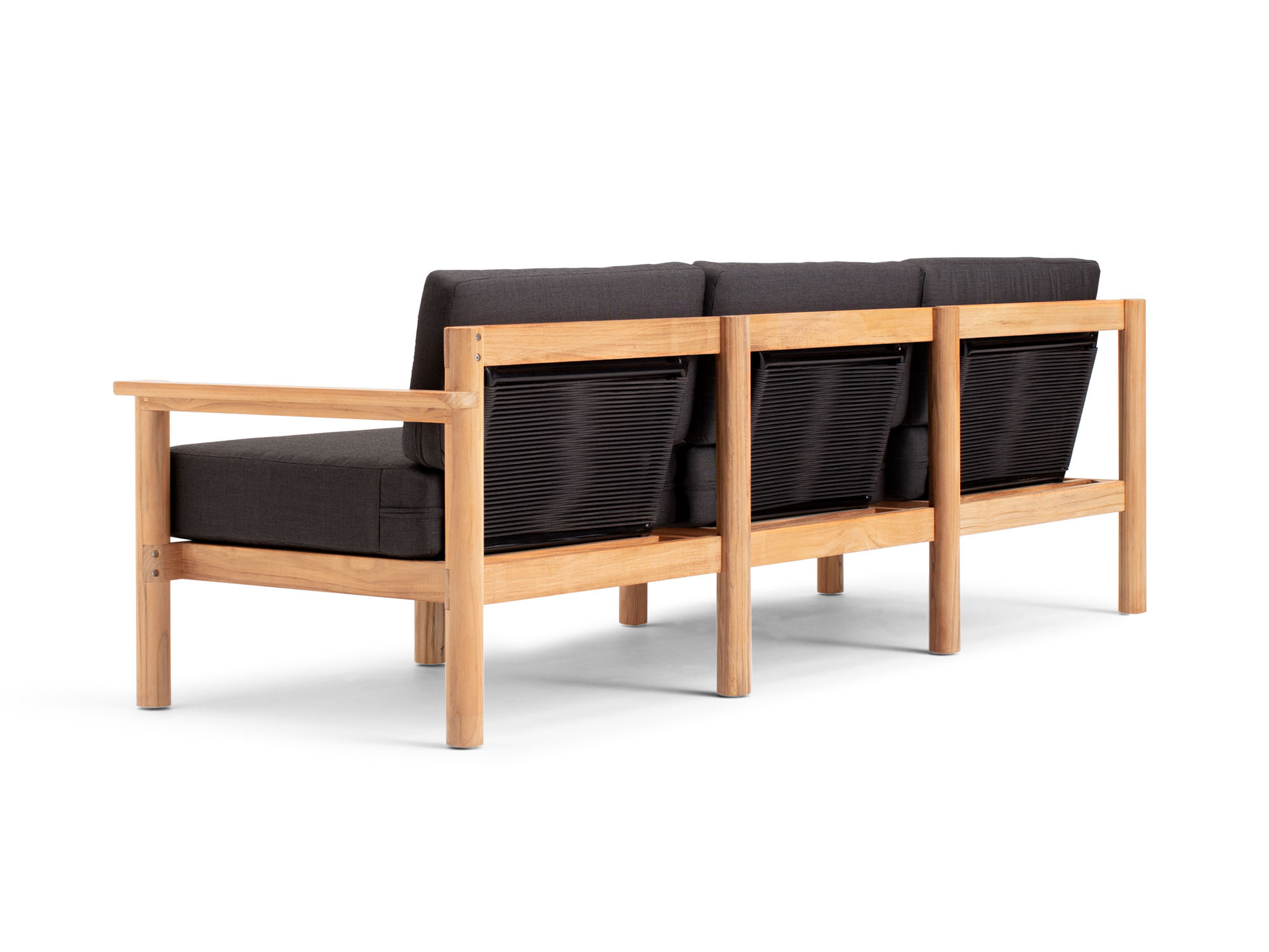 Back angle view of outdoor sofa with black cushions